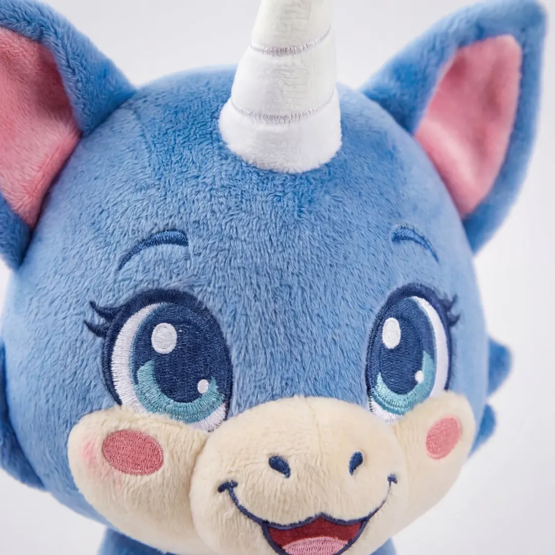 A close-up of Pearl’s embroidered face