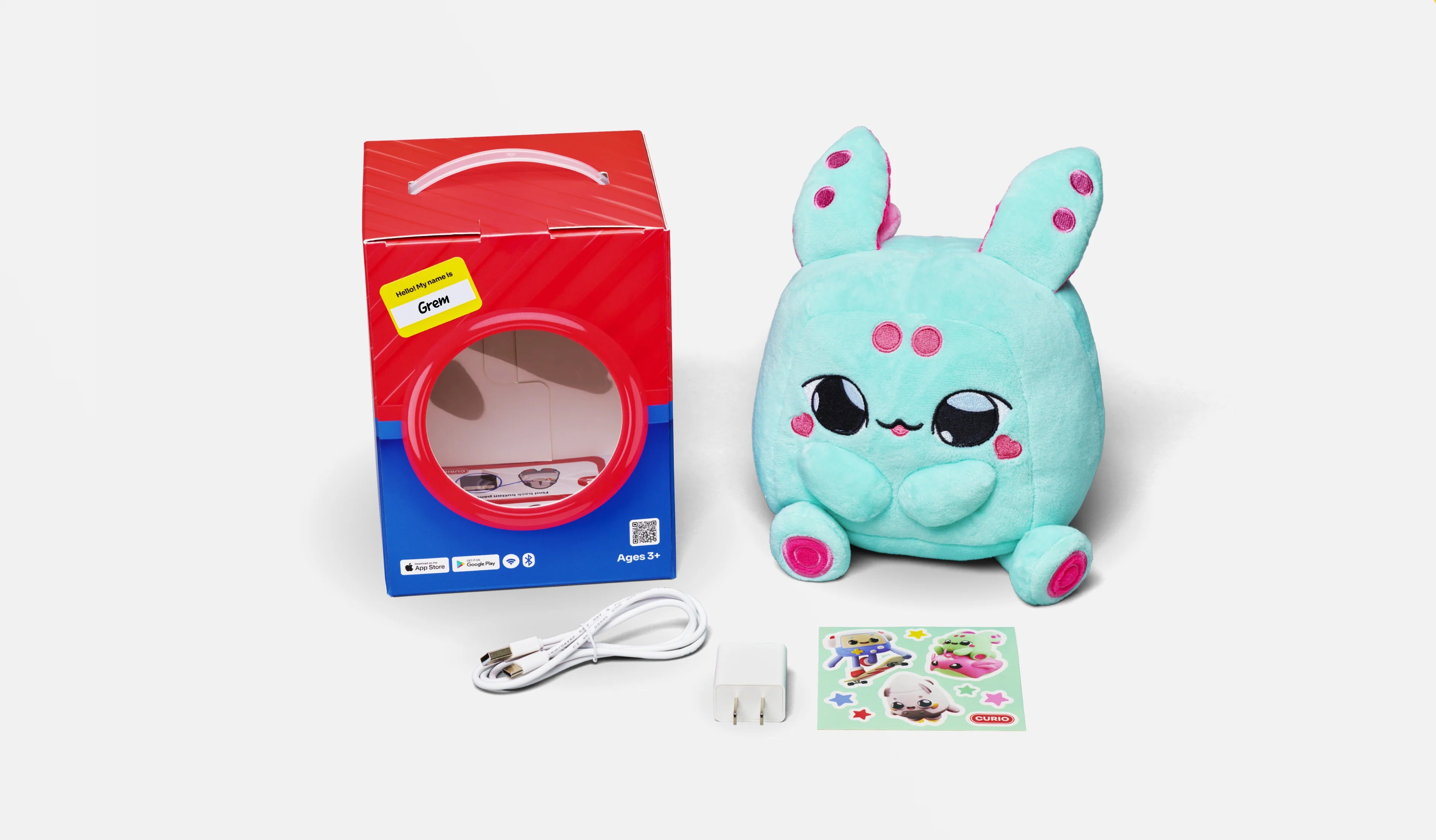 Curio AI plush companion with box and accessories